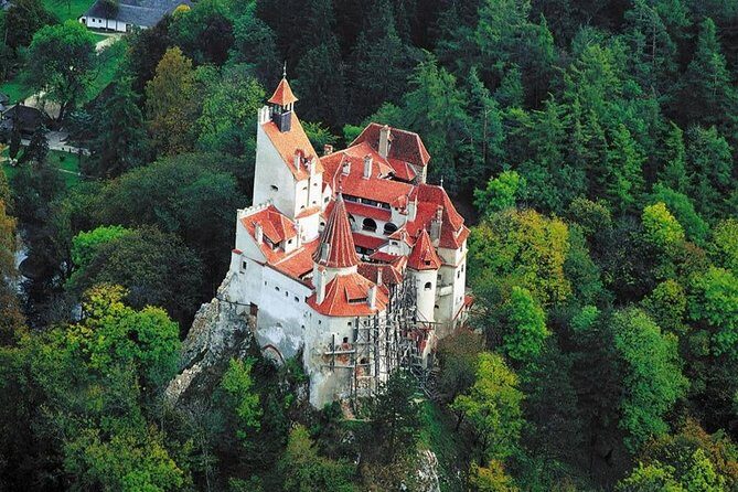 2 days Transylvania Tour with Brasov, Sibiu and Sighisoara - Brasov: Council Square, trade names, and the fortress walls you can still see