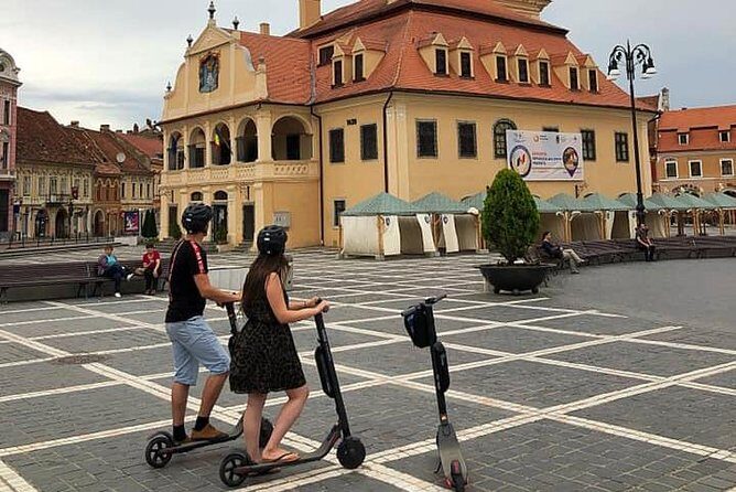 Brasov Old Town Guided Tour With Electric Scooters - What to Pack and How to Ride Comfortably