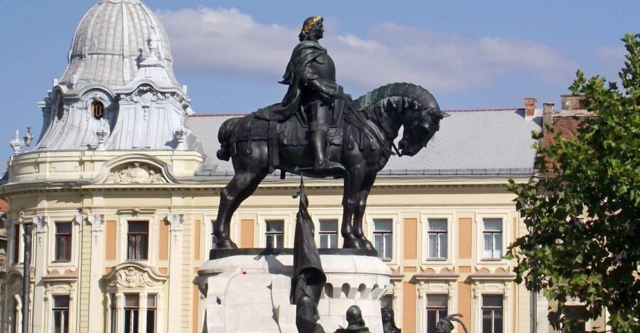Cluj: Private City Walking Tour - Museum Square in summer: terraces, color, and “everyday Cluj”