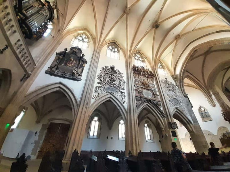 Corvin Castle and Sibiu Fortified City day tour from Cluj - How the day feels: timing, walking surfaces, and castle stairs
