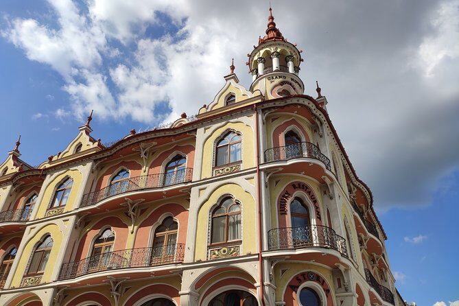 Discover Oradea - Walking Tour with Local Food Tasting - Republicii Street and the palaces: elevator stories and turquoise drama