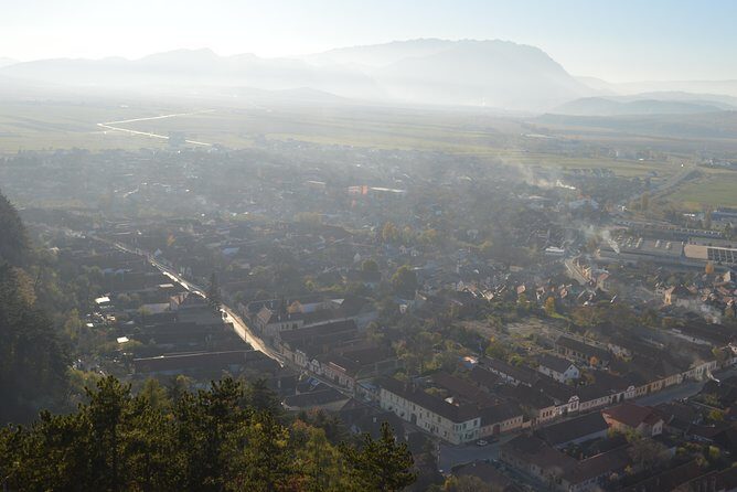 Exclusive Tour: Bran Castle, Brasov and Rasnov fortress from Sibiu - Rasnov Citadel: Panoramic mountain views with a renovation catch