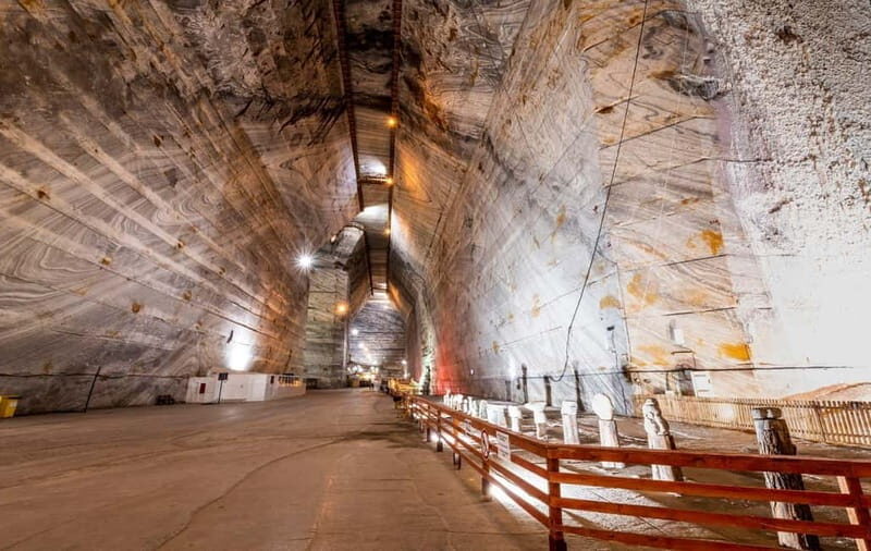 From Bucharest: Slănic Prahova Salt Mine Ticket and Transfer - Entering the mine complex: 217 meters down and 55-meter chambers