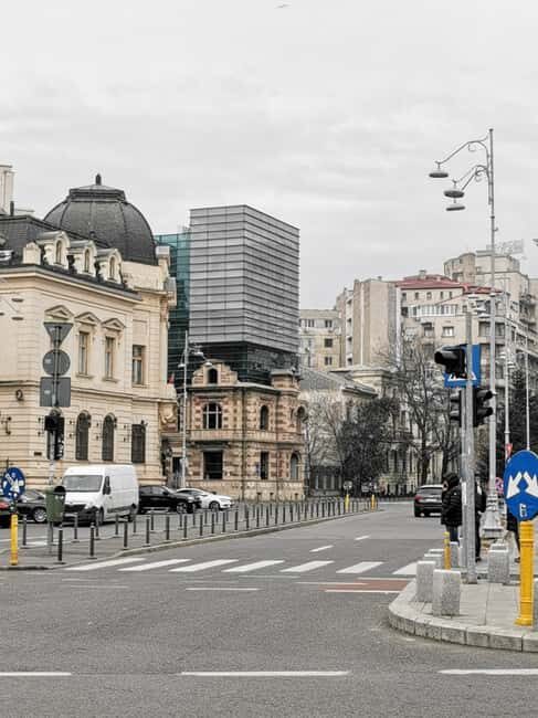 Hop-on Hop-off minibus Tour of Bucharest & Village Museum - Revolution Square: short walking, strong context
