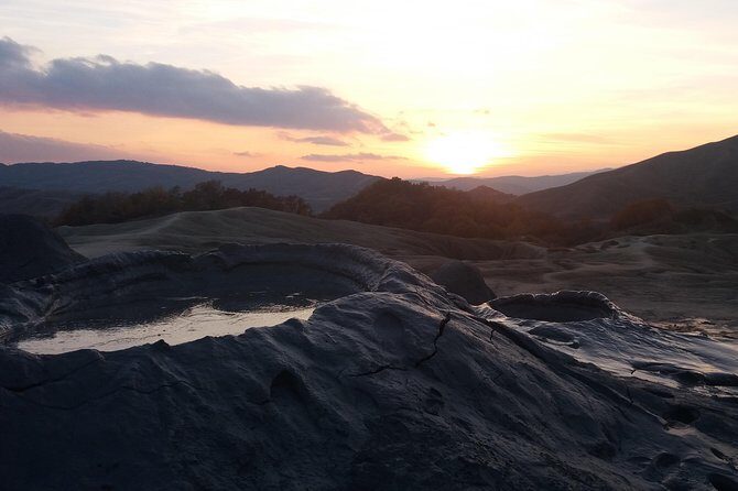 Salt Mine, the Muddy Volcanoes and Wine Tasting Private Day Tour from Bucharest! - Mud Volcanoes at Vulcanii Noroiosi: Fun Even When It’s Rainy
