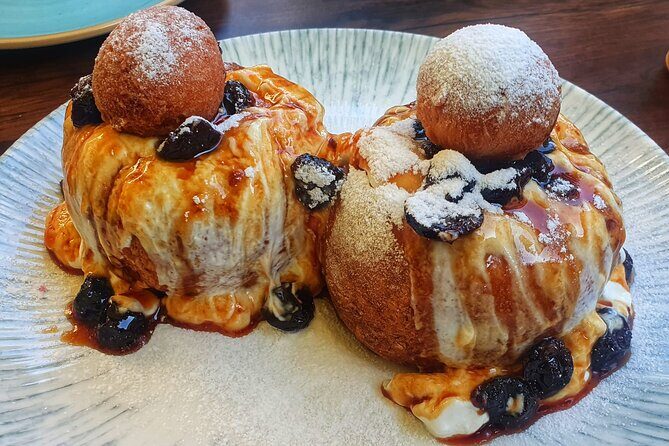 Sweet Delights History and Desserts Walking Tour in Bucharest - Old Town finale: Papanasi and the best kind of ending